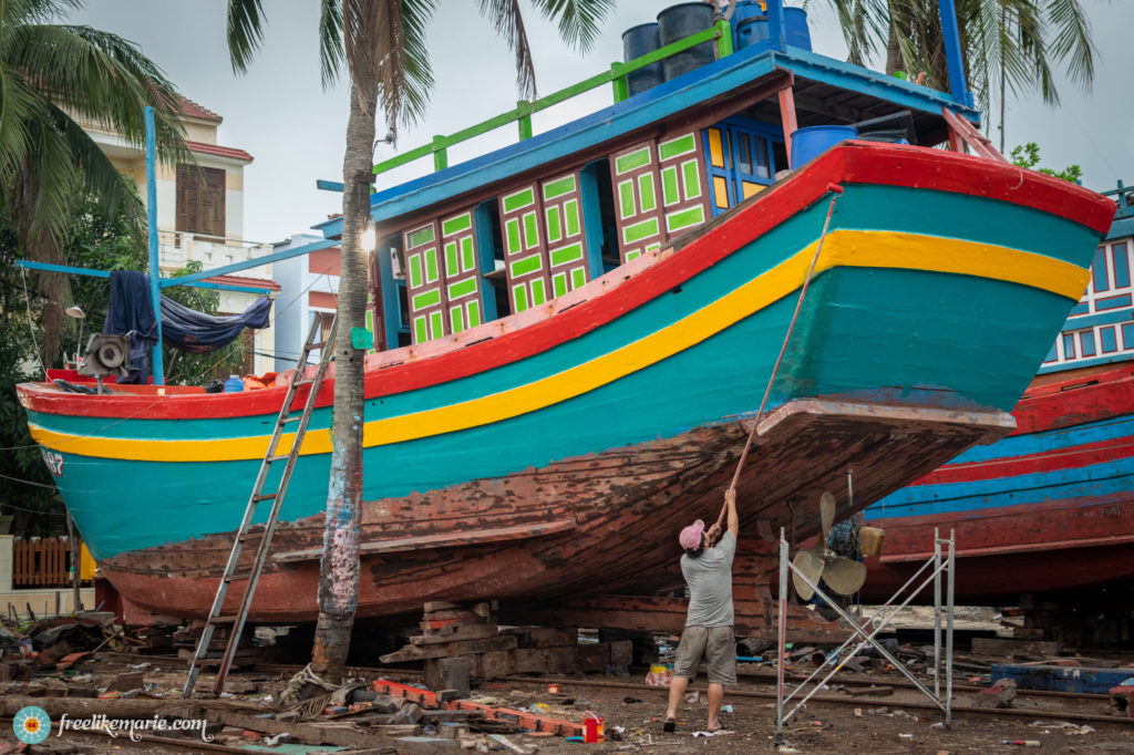 Painting a Colorful Fishing Boat in Cua Dai Vietnam